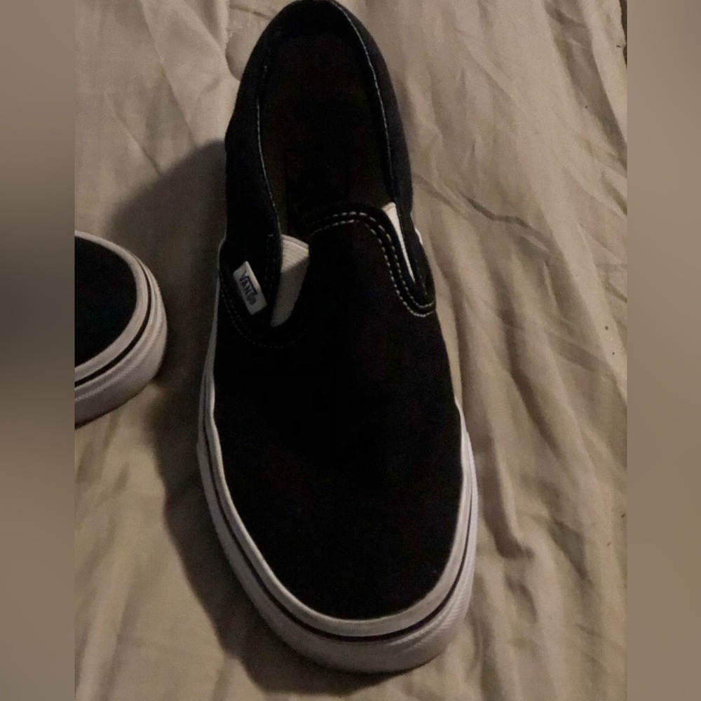 Black canvas slip on Vans size 6.5
